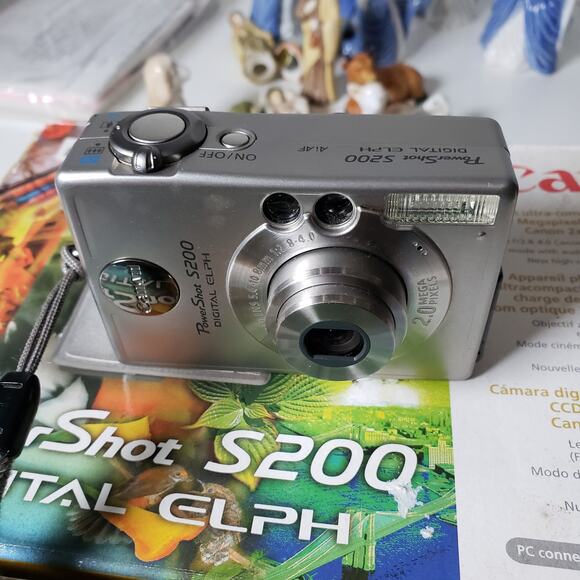 Cannon PowerShot S200 Digital Elph Camera Silver Tested Working Battery Charger - Picture 1 of 8